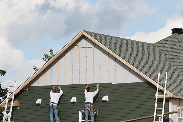 Professional Siding Repair technician working in Barton, OH
